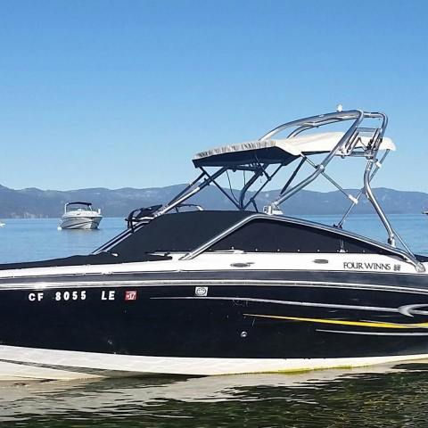 a small boat in a large body of water